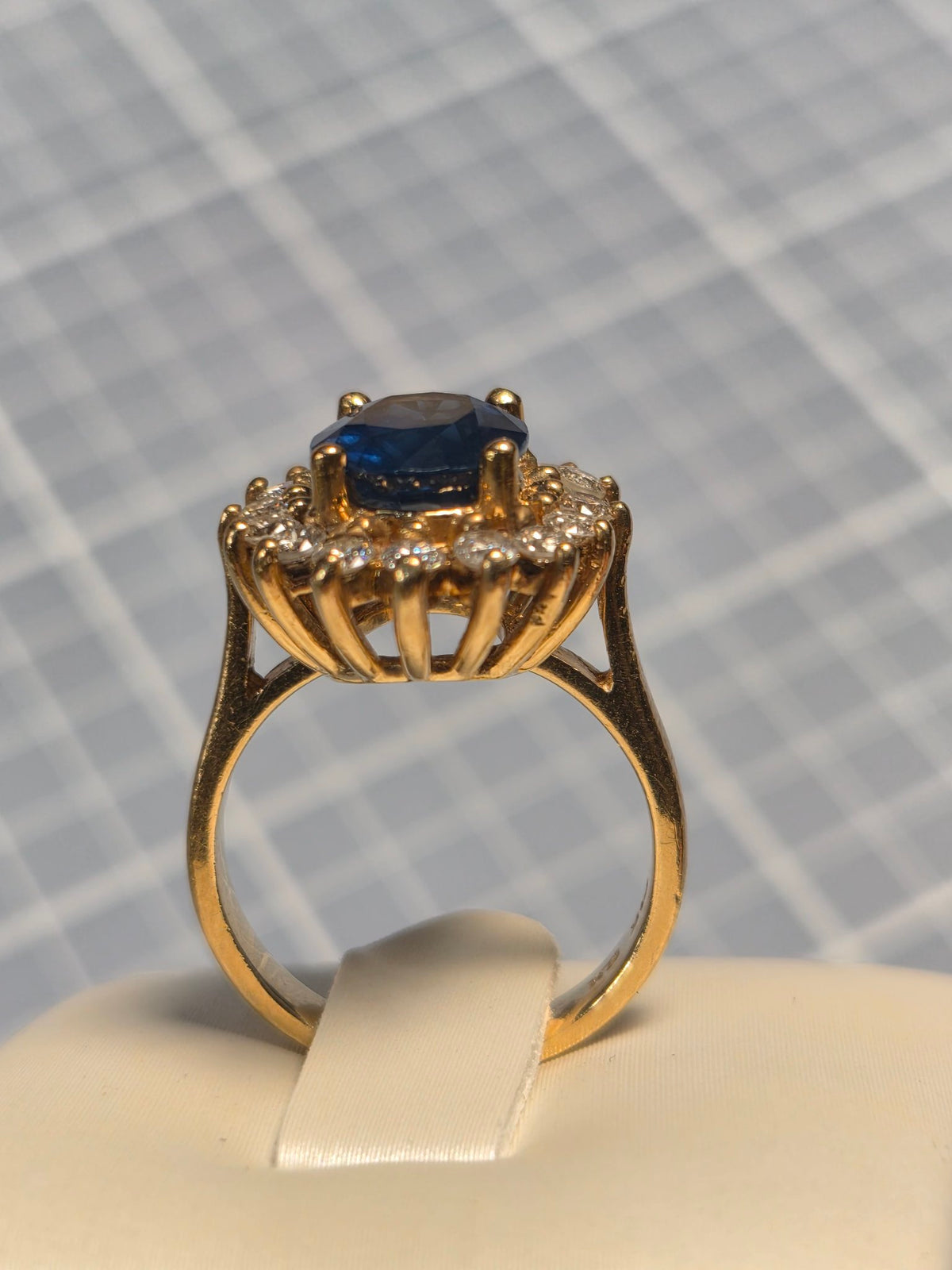Sapphire and Diamond Halo Ring in Yellow Gold