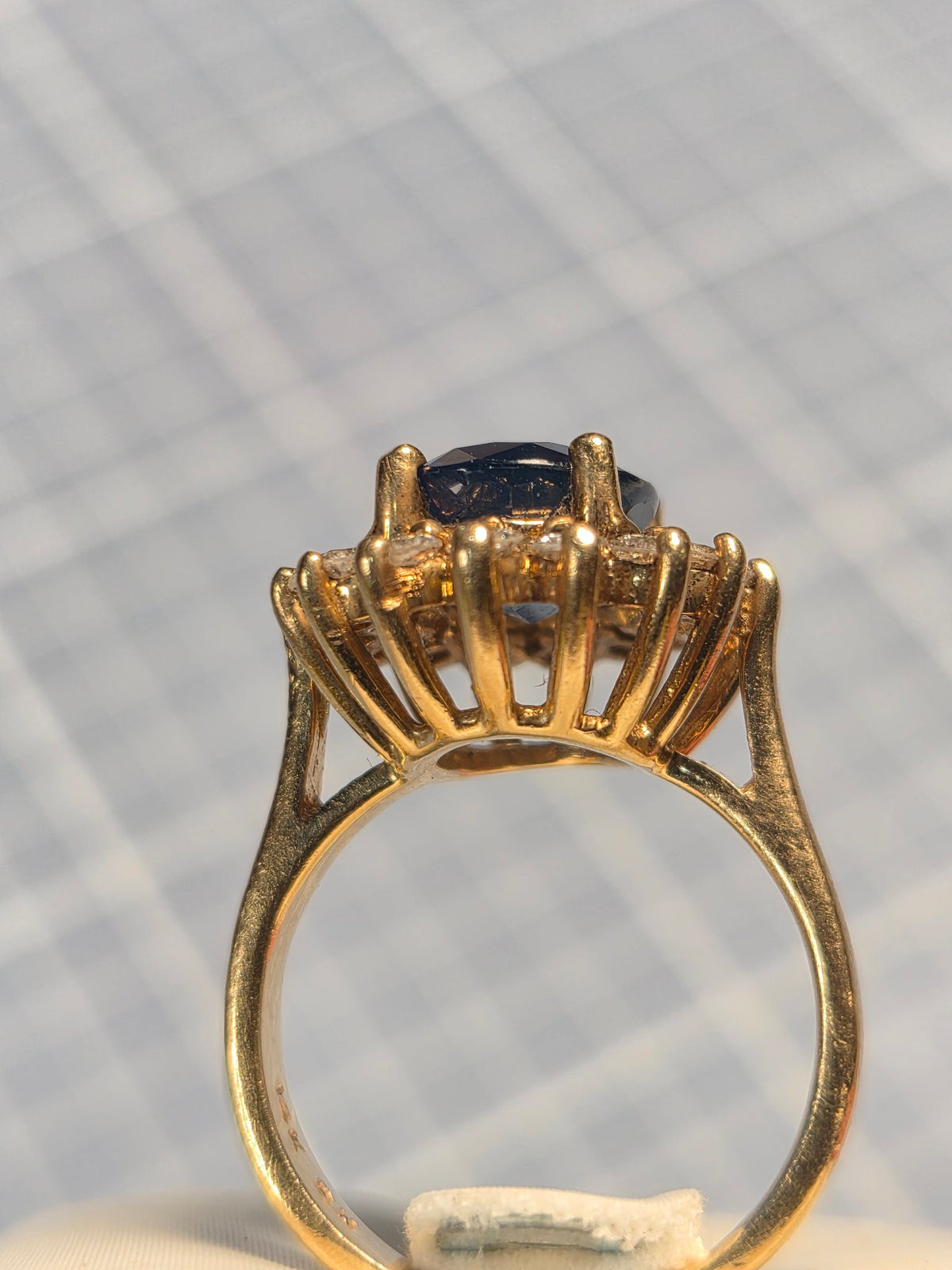 Sapphire and Diamond Halo Ring in Yellow Gold
