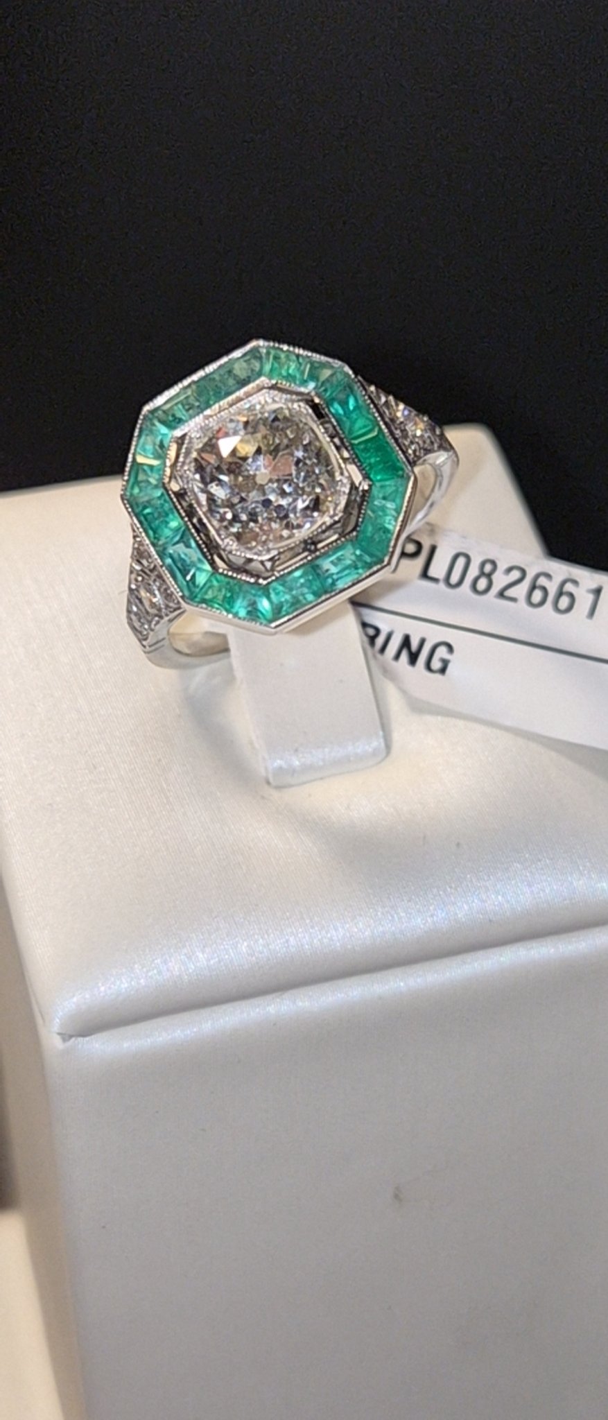 Octagonal Diamond Ring with Emerald Baguette Halo