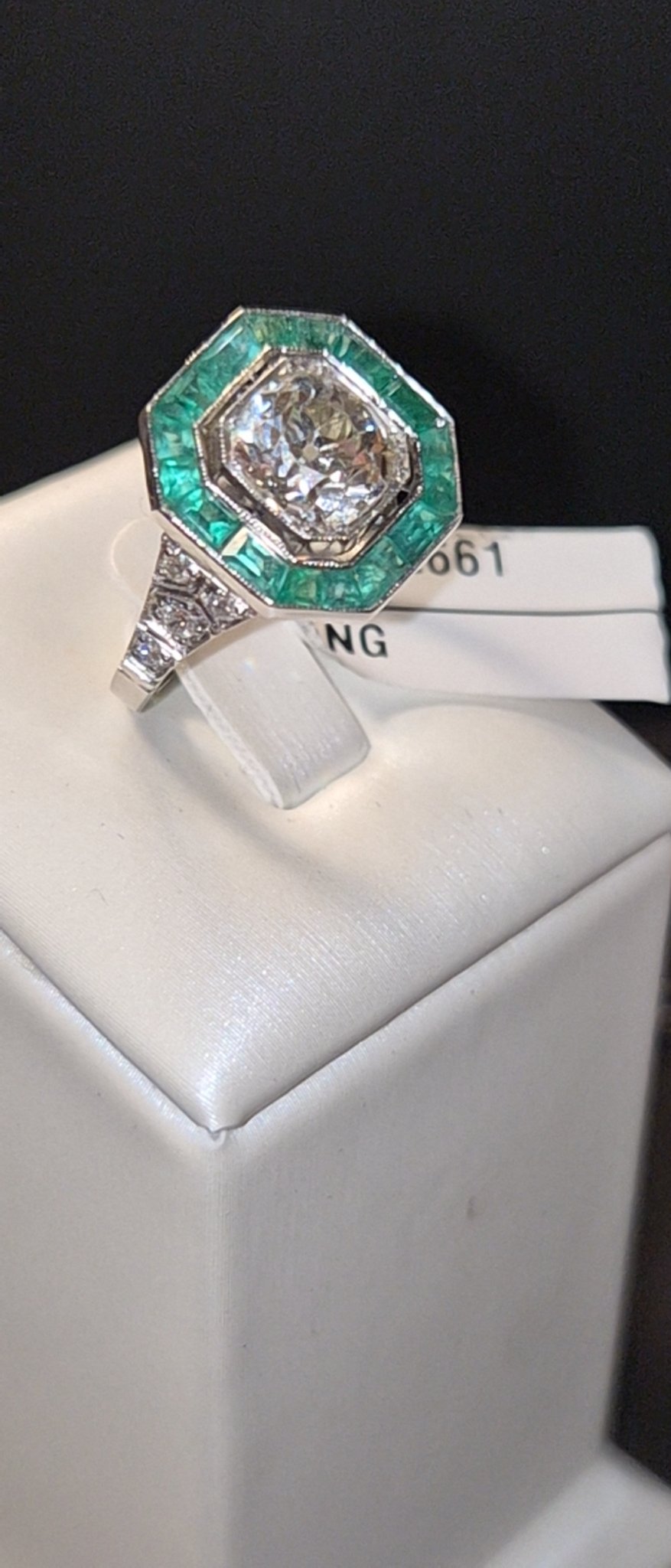 Octagonal Diamond Ring with Emerald Baguette Halo